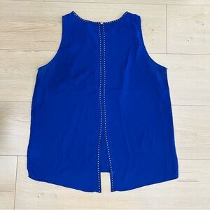 Renee C. Vibrant Blue Sleeveless Blouse with Gold Metal detail